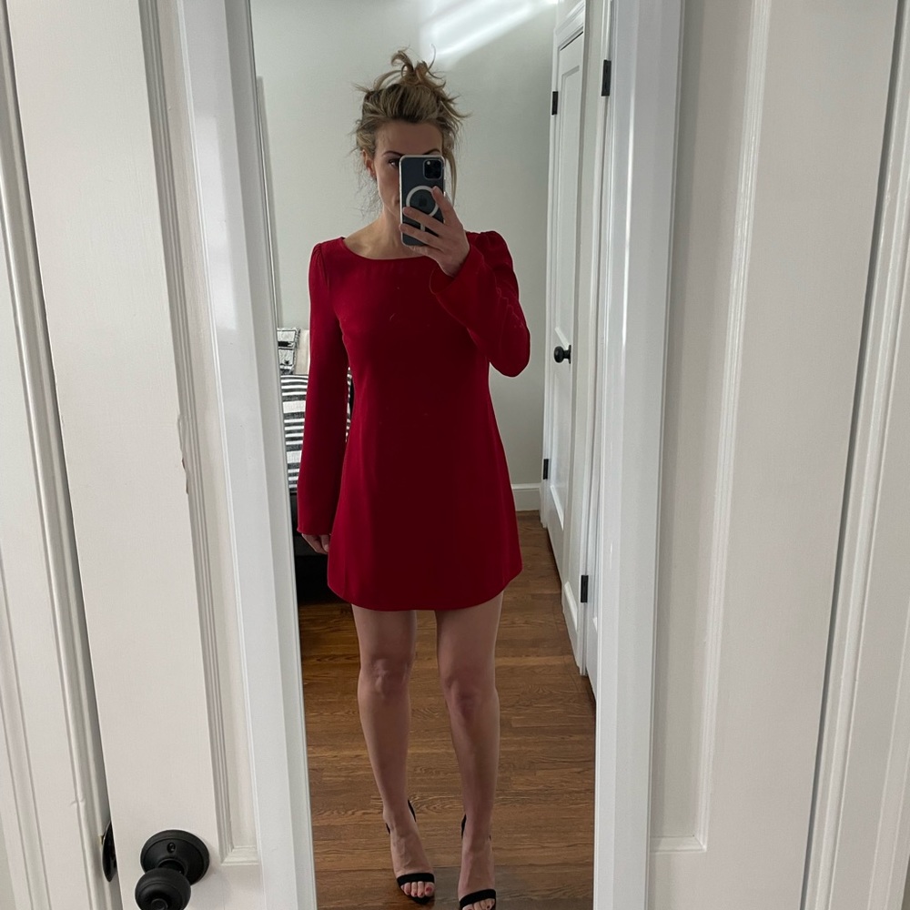 Red GF long sleeve mini- dress with gold button details, open back.